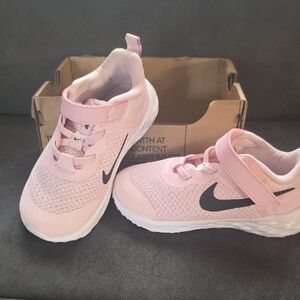 Nike Size 10 Kids Light Pink and Black Sneakers